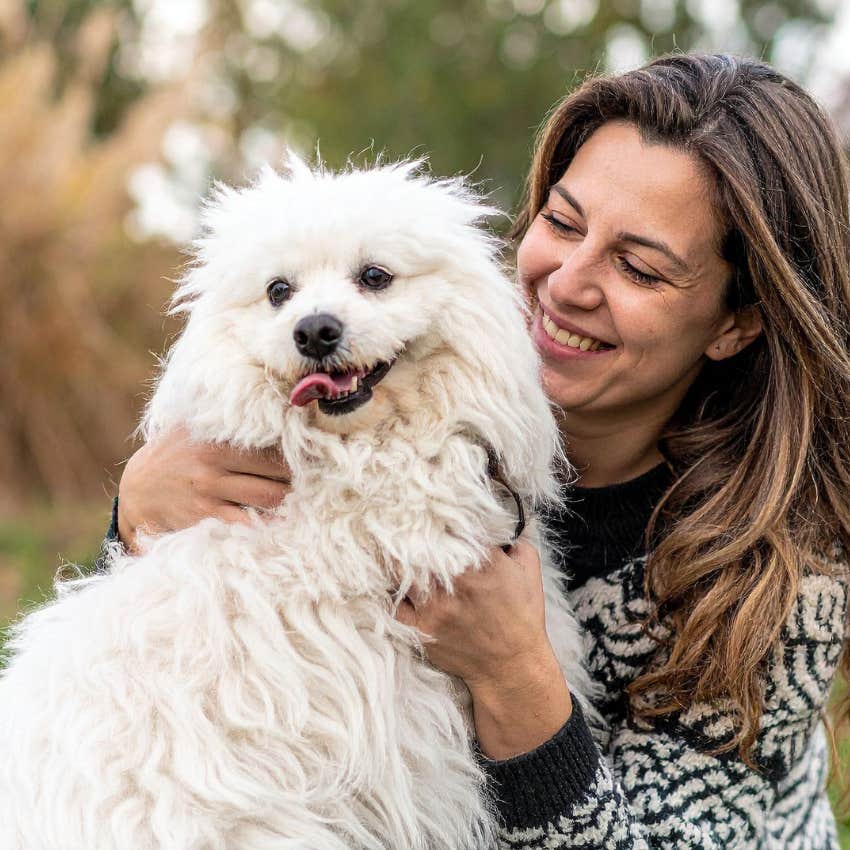 gen x woman with her pet dog