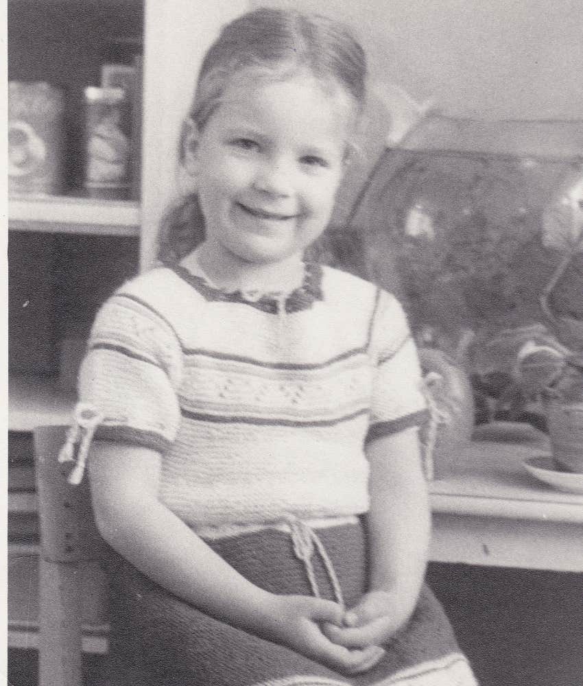 black and white photo of a Gen X girl when she was around age 8
