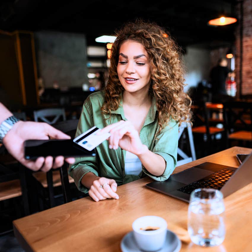 Gen Z woman who doesn't sacrifice all the time buying a coffee