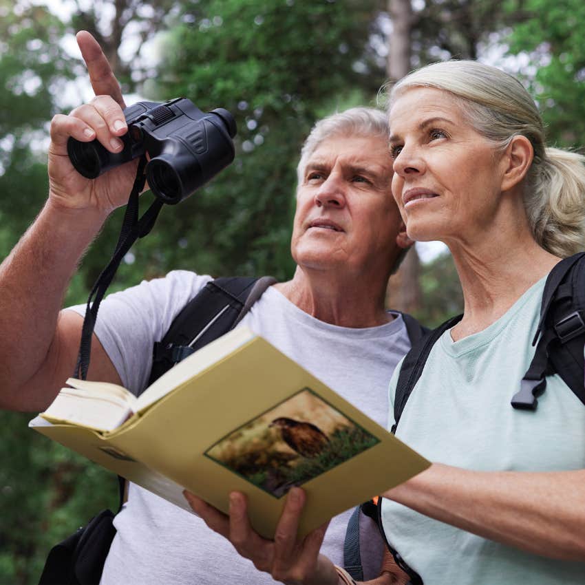 boomer couple bird watching as a fun hobby