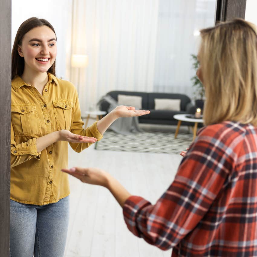 millennial woman respecting neighbor's boundaries welcoming her in