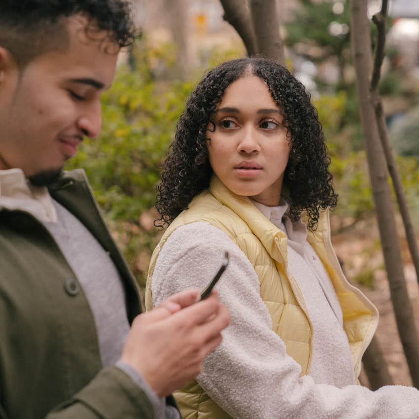 millennial woman thinking someone is a cheater