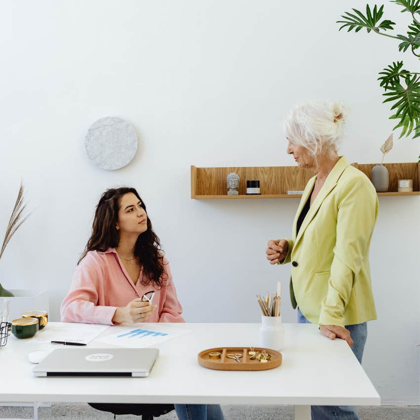 older and younger colleagues having conversation about accountability
