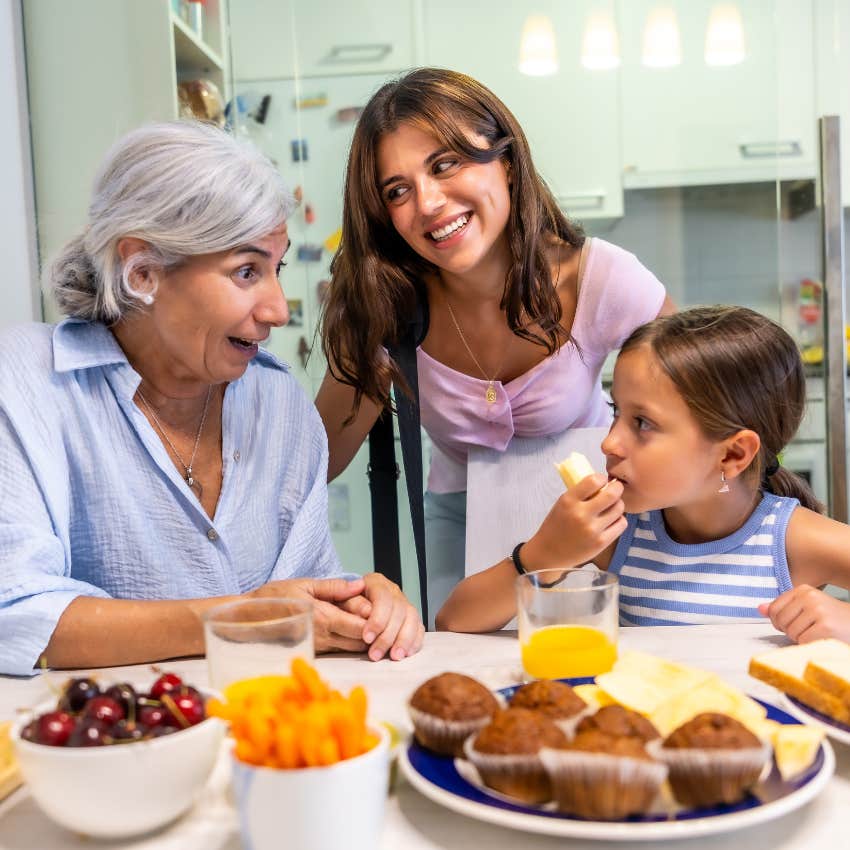 good grandmother with her granddaughter and millennial daughter