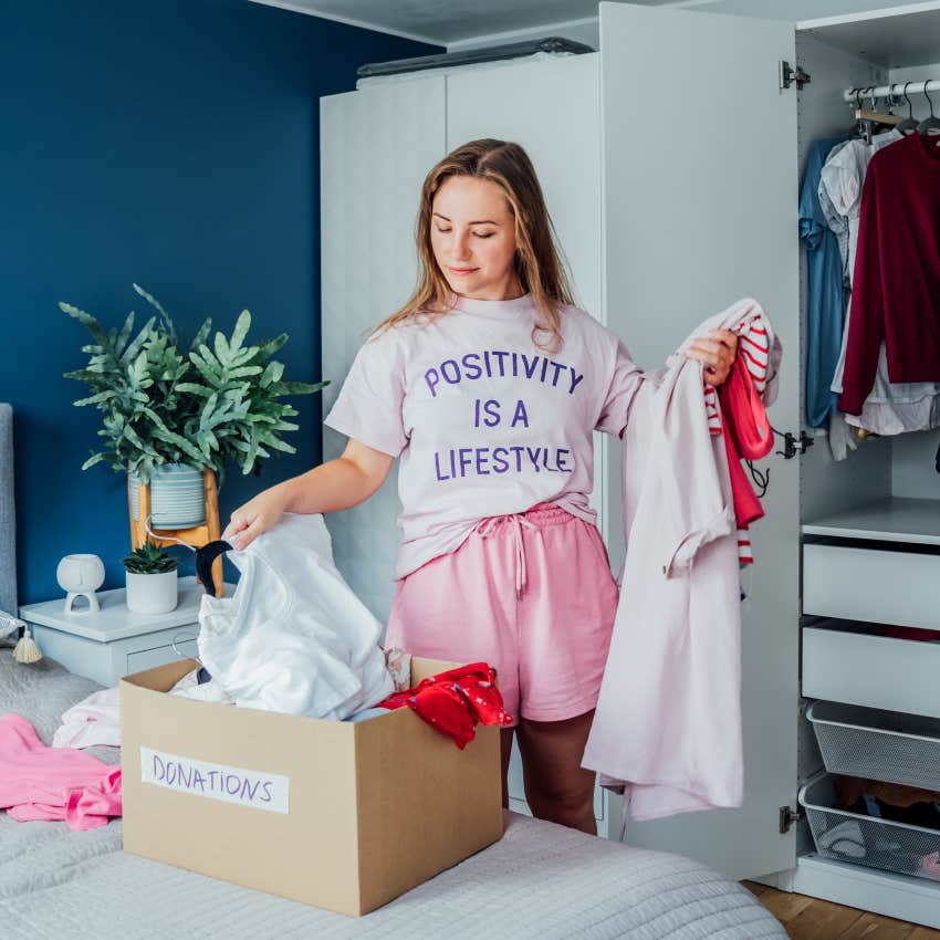 woman getting rid things with bad memories in her home