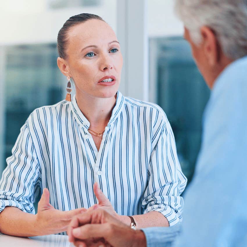 high emotional IQ woman apologizing to older man