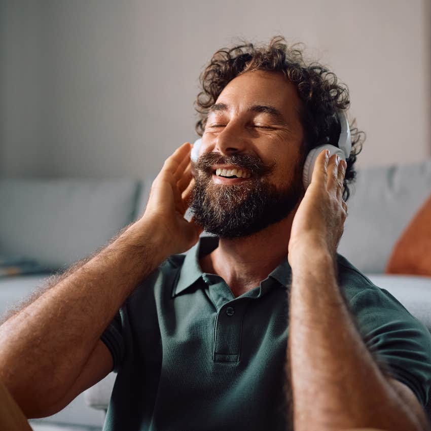 kind man without many friends happily listening to music