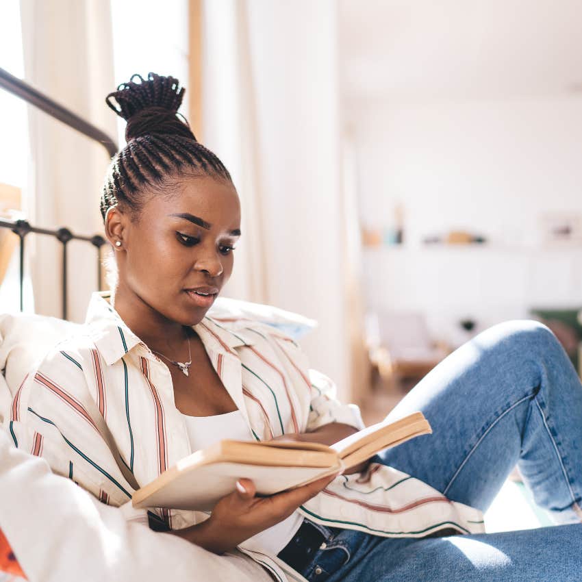 kind woman without many friends happily reading