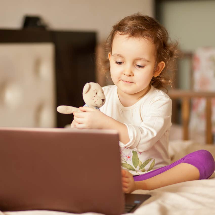 little girl watching show on laptop has limited screen time