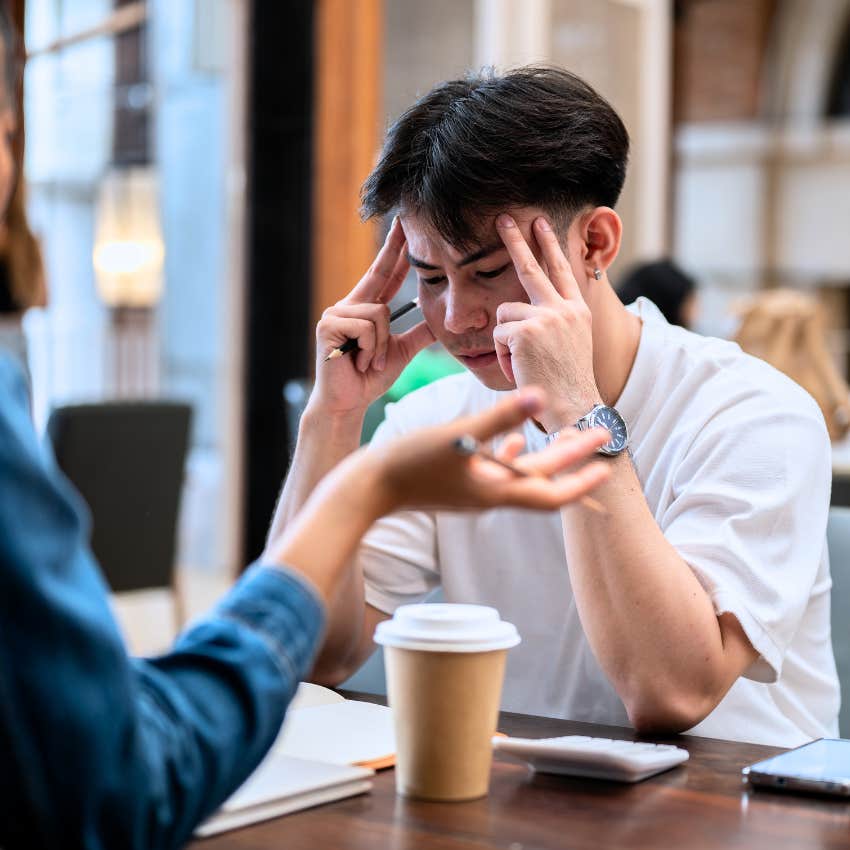 Man who struggles to trust people talking to a friend