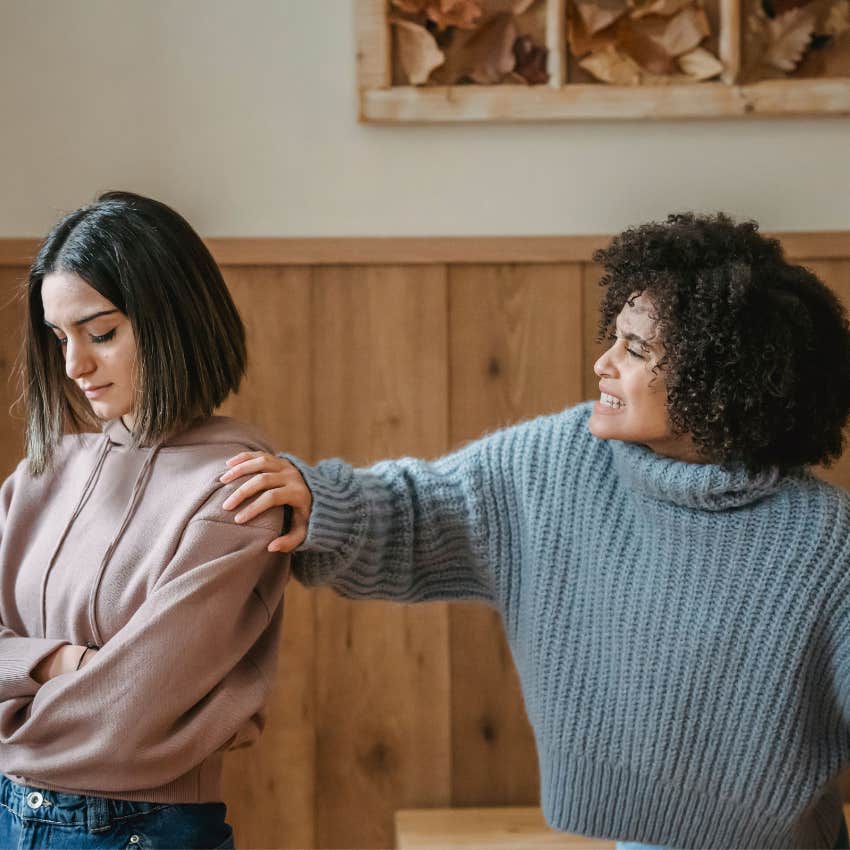 Adult woman apologizing during an everyday conversation despite having done nothing wrong