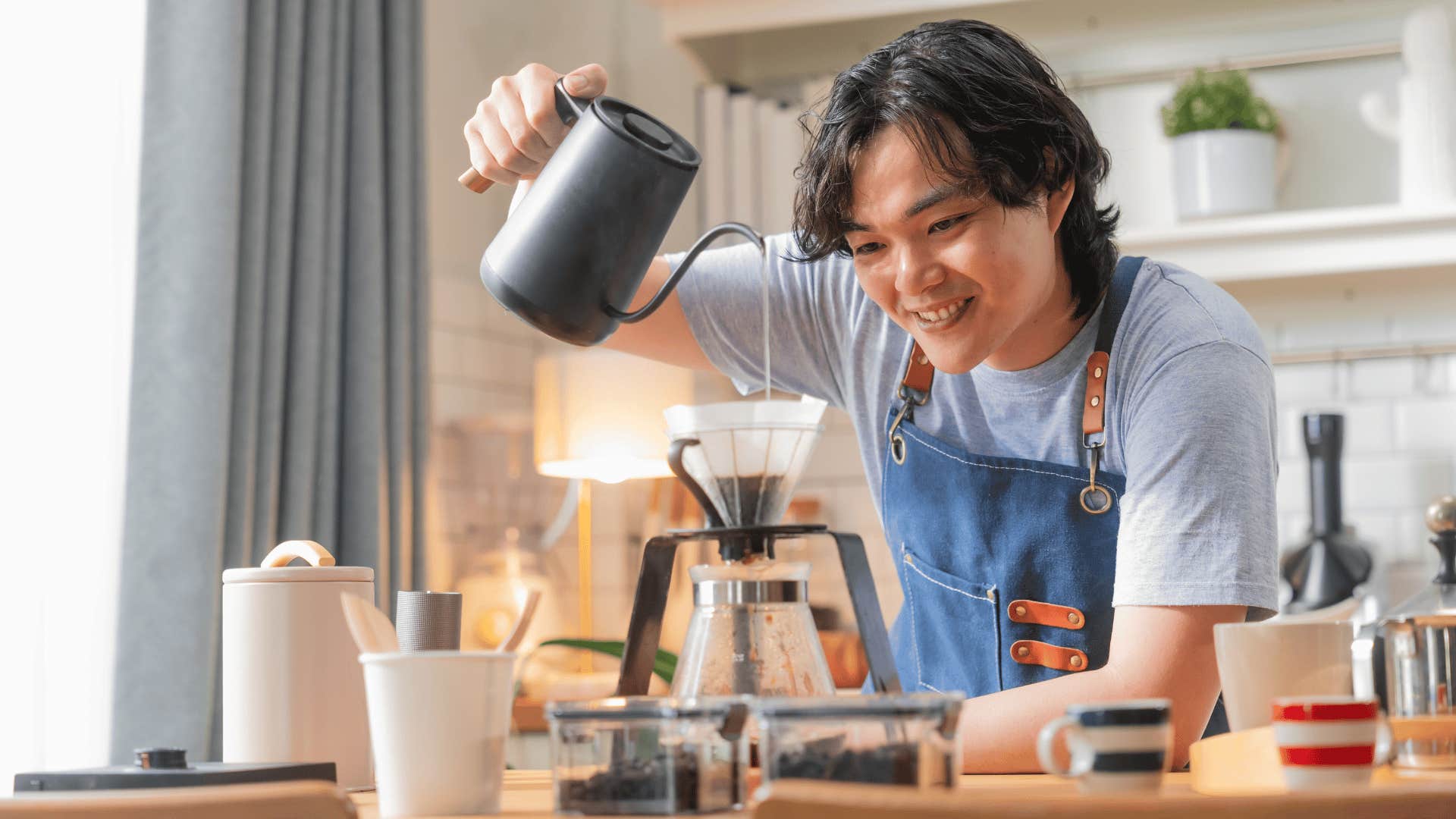 man making coffee at home