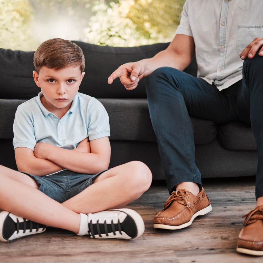 kid being scolded as a result of his bad behavior