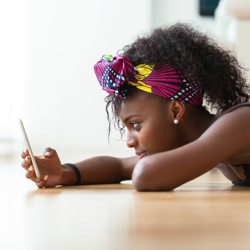girl texting her friends using slang from her generation