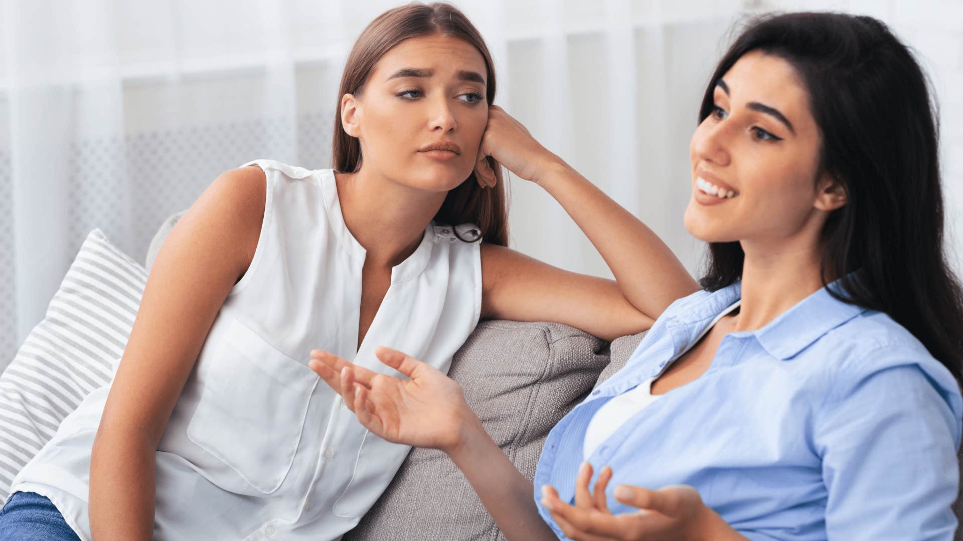 empathic woman noticing friend's fake smile