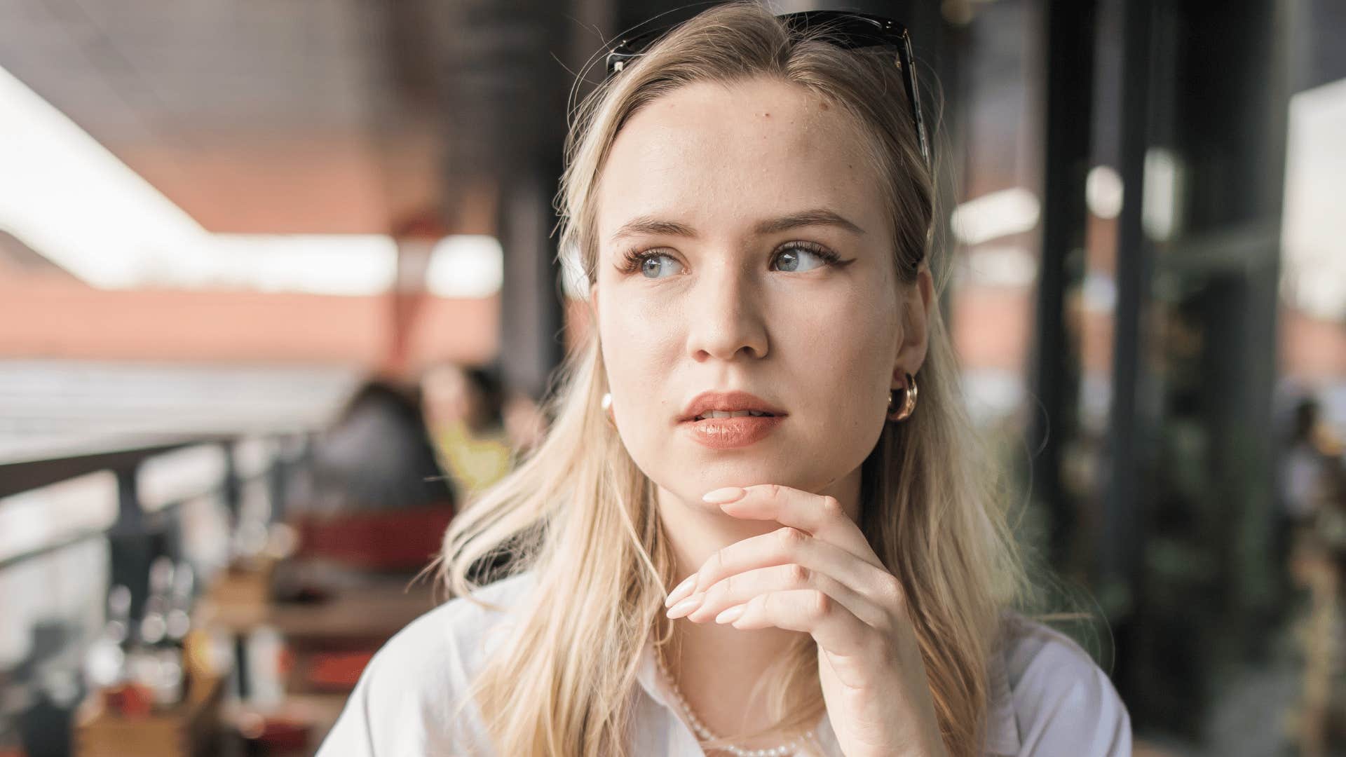 woman thinking deeply picking up on tension