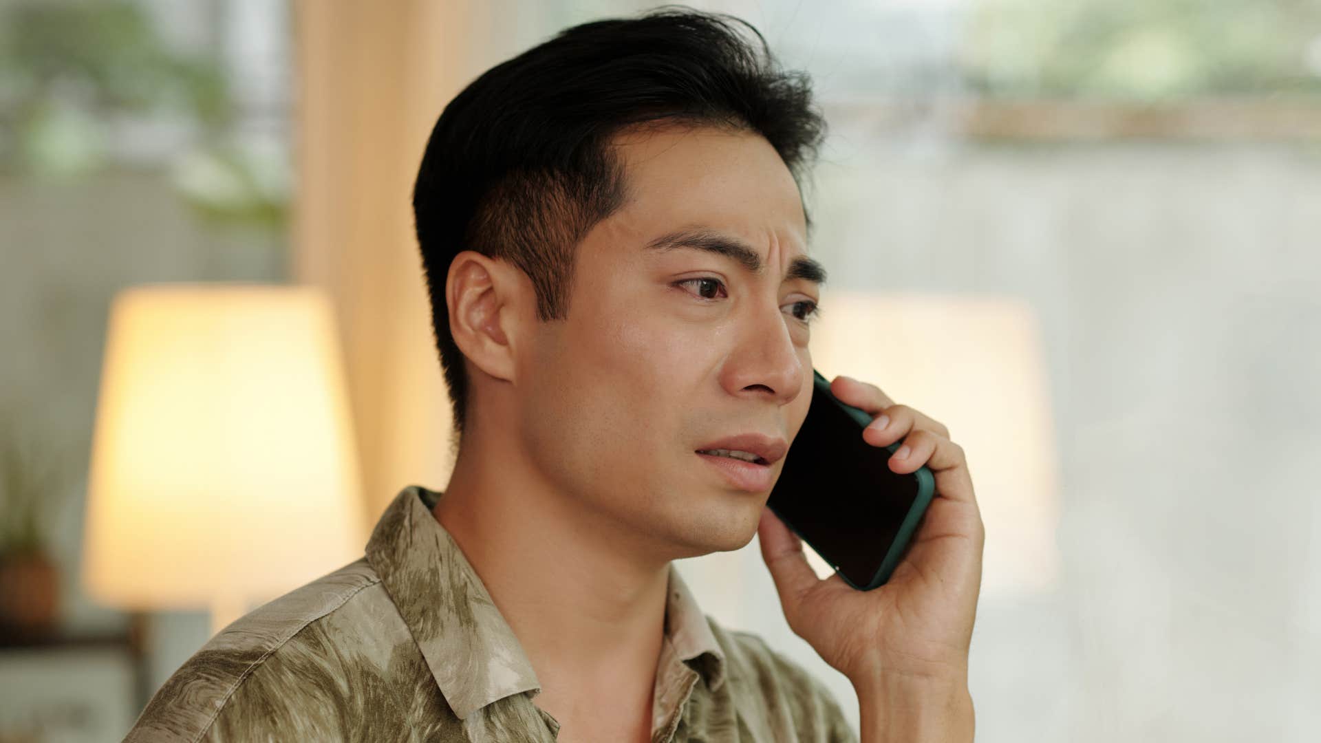 mentally emotionally exhausting man on phone telling someone thatll never work