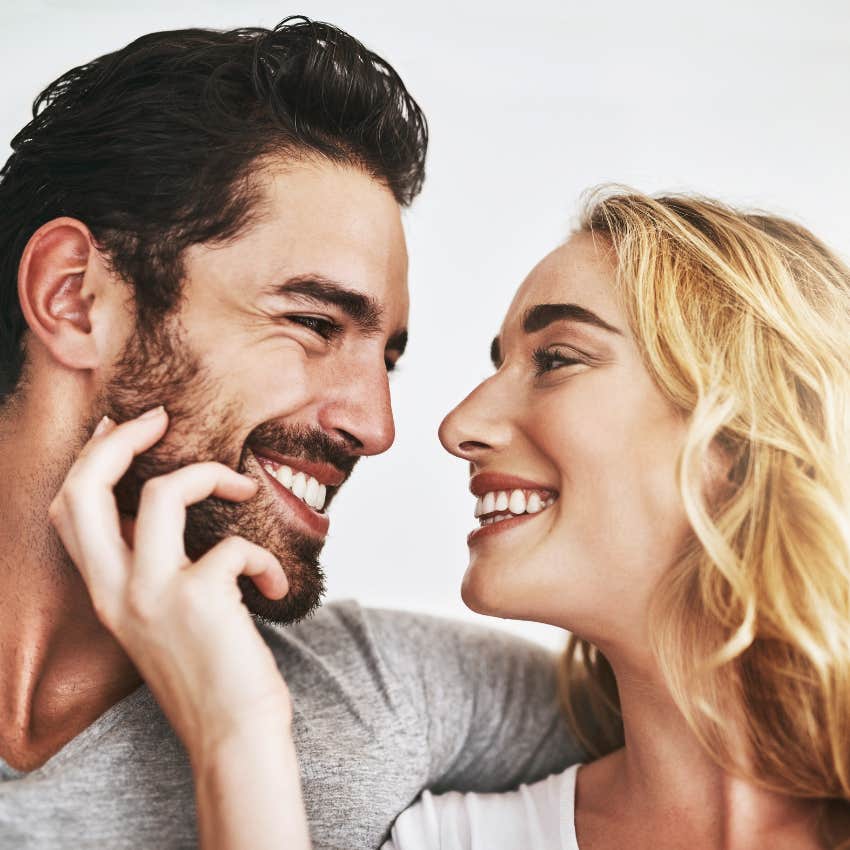 mentally emotionally sensitive man smiling because girlfriend is making sure he isn't overstimulated