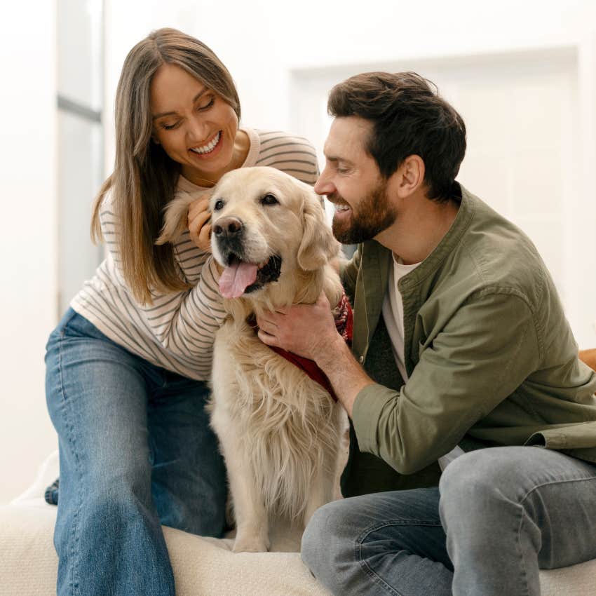 millennial couple with their pet dog