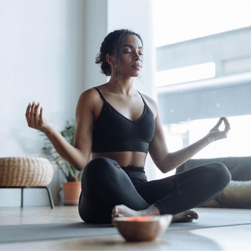 millennial woman practicing mindfulness and meditation