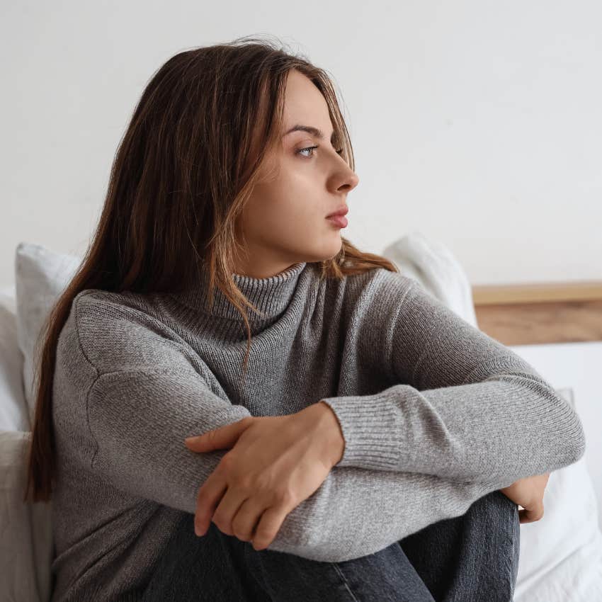 woman who tries to avoid feeling strong emotions