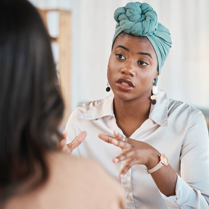 woman with intellectual curiosity taking time to listen to colleague