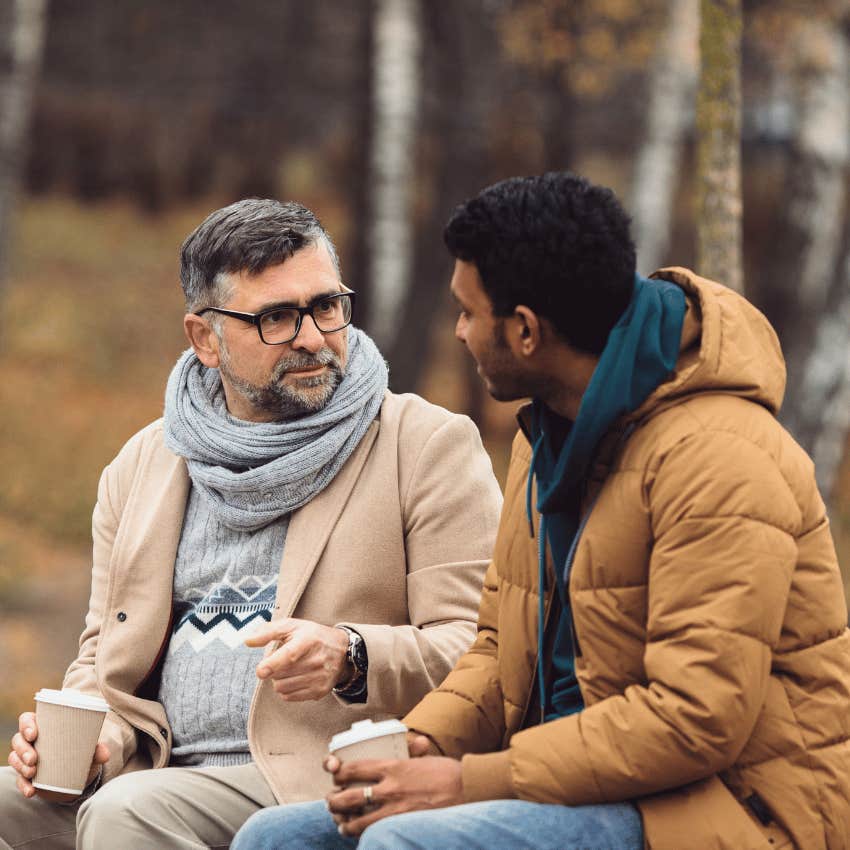 older man sounding smart asking his friend for advice