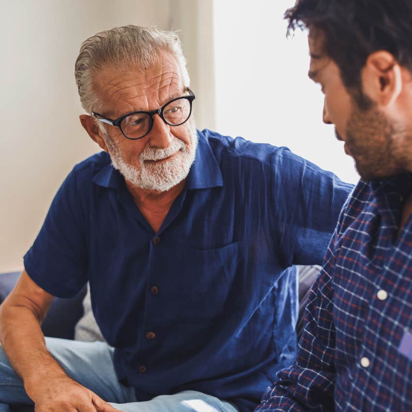 older man talking with younger man