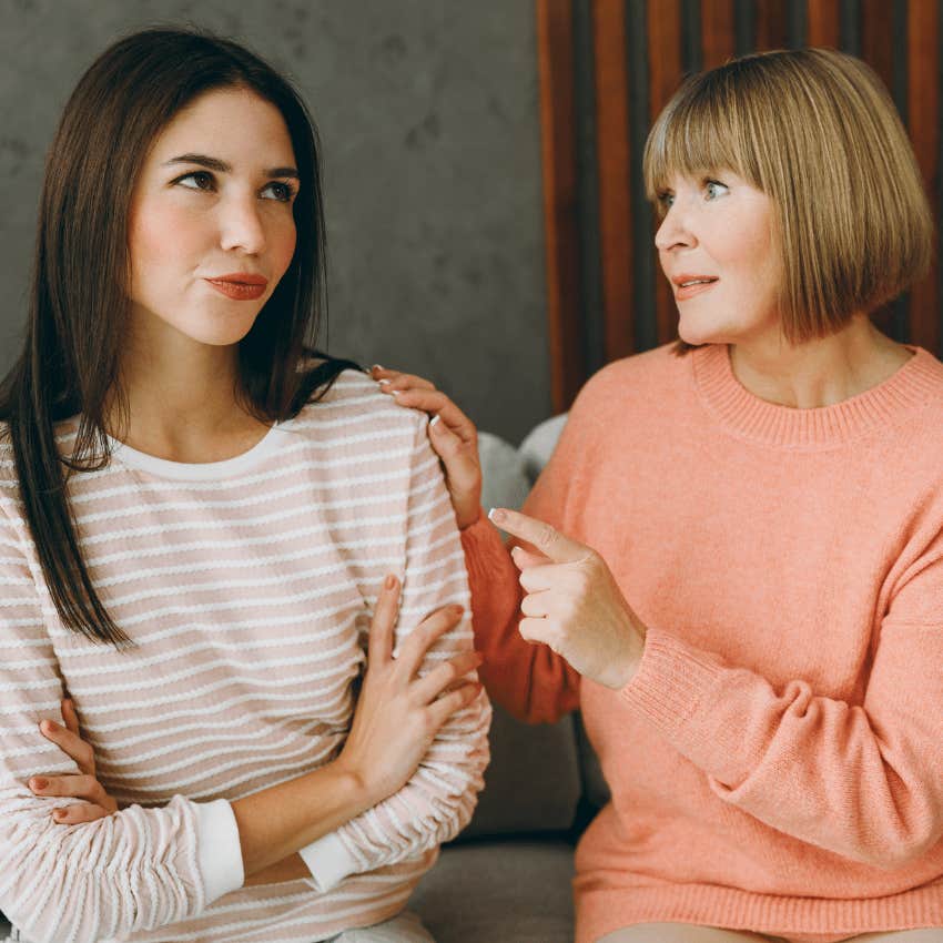 older woman giving advice to younger woman