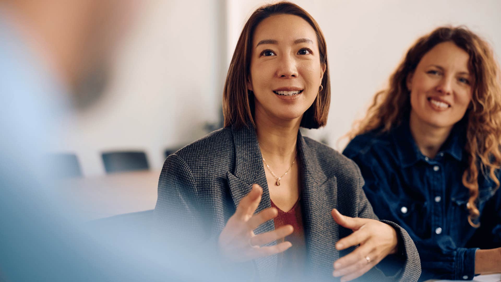 woman explaining to co-worker she's always done it this way