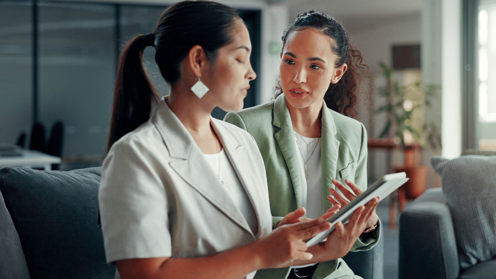 woman telling colleague no offense but