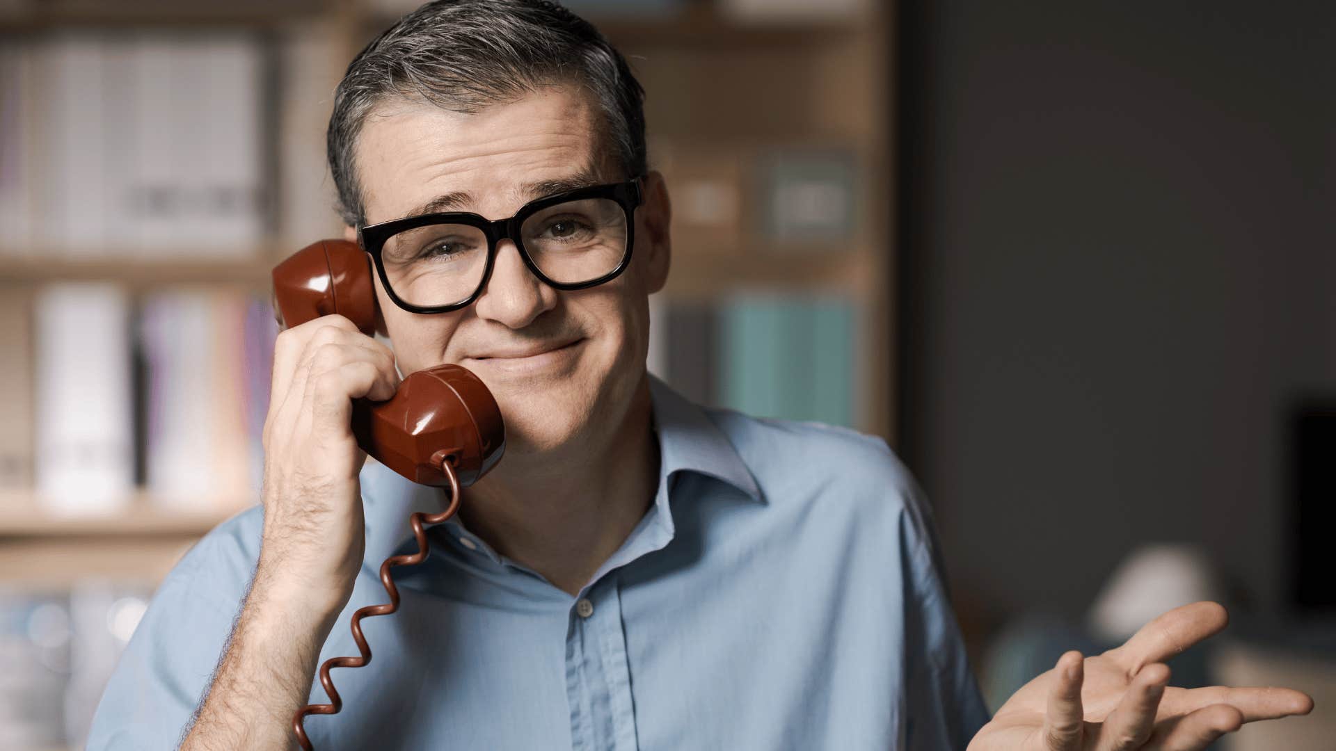 rude man on the phone shrugging saying that's never happened to me