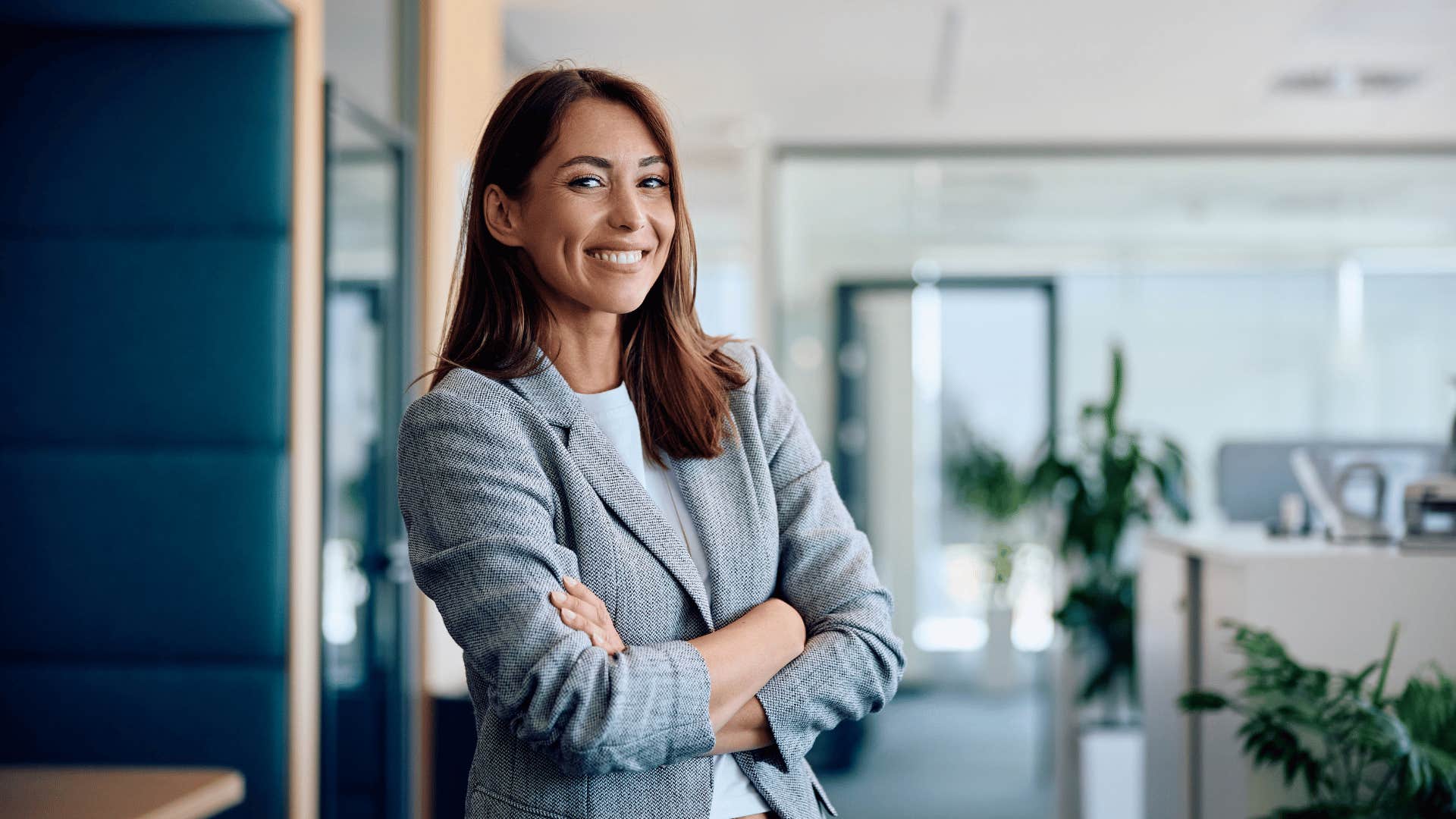 woman in gray jacket looking confident as she smiles and says i don't need anybody but myself