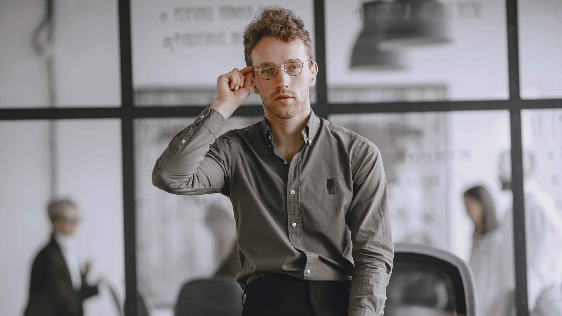 young man at work not wearing business casual attire
