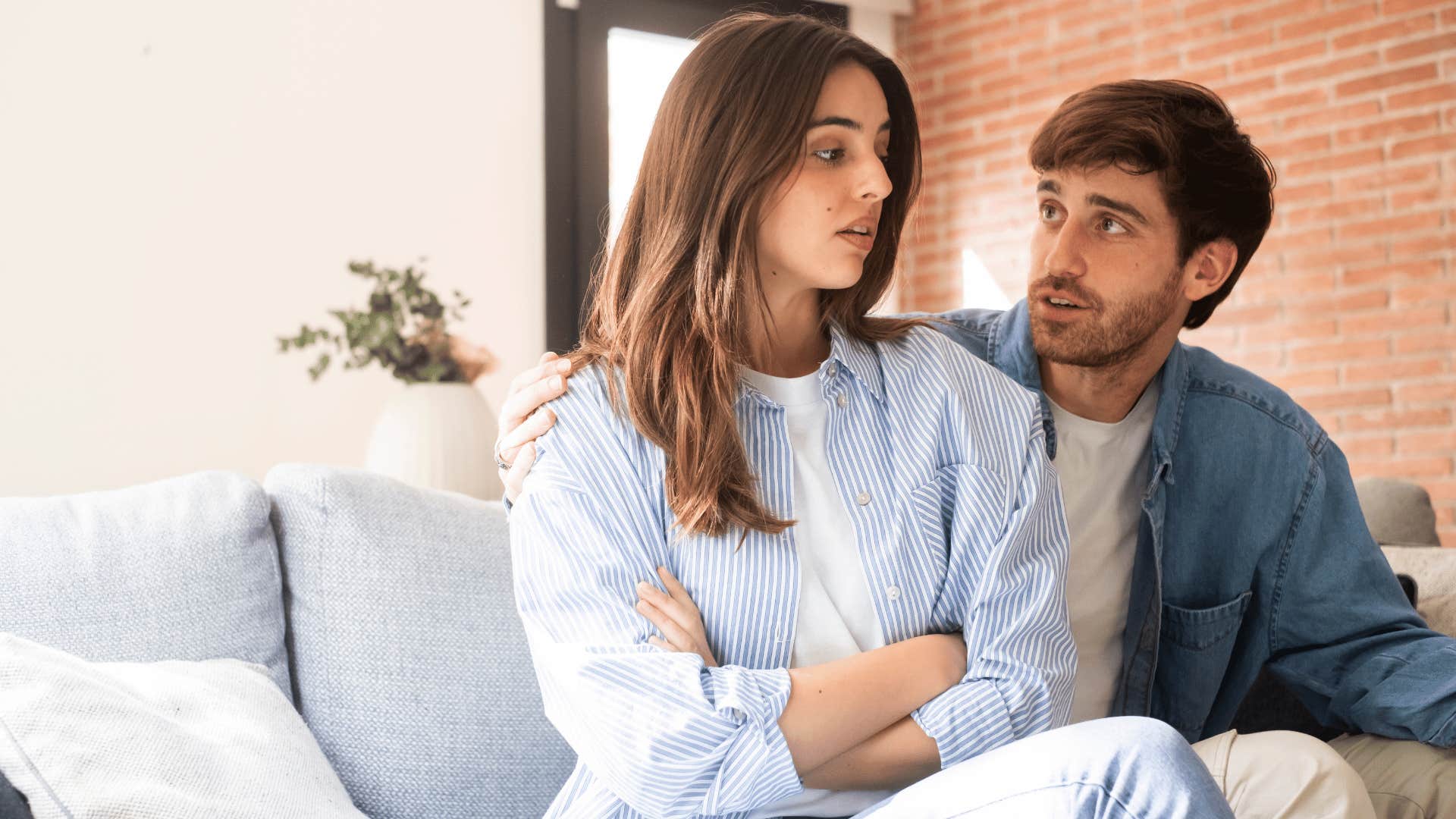 sketchy woman being defensive to her partner saying she doesn't feel bad