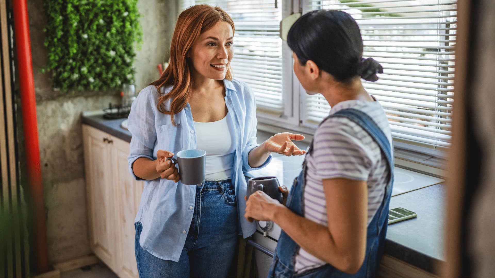 coworker with blonde hair asking woman over coffee break did that make sense