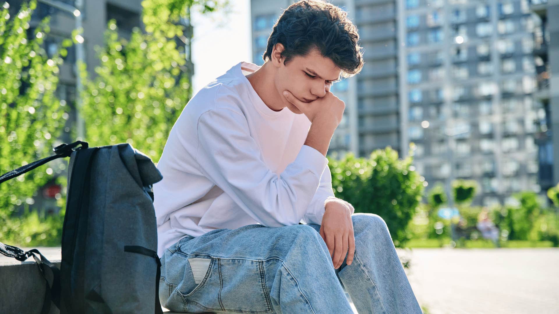 man in pink shirt upset as he thinks i can't deal with this right now
