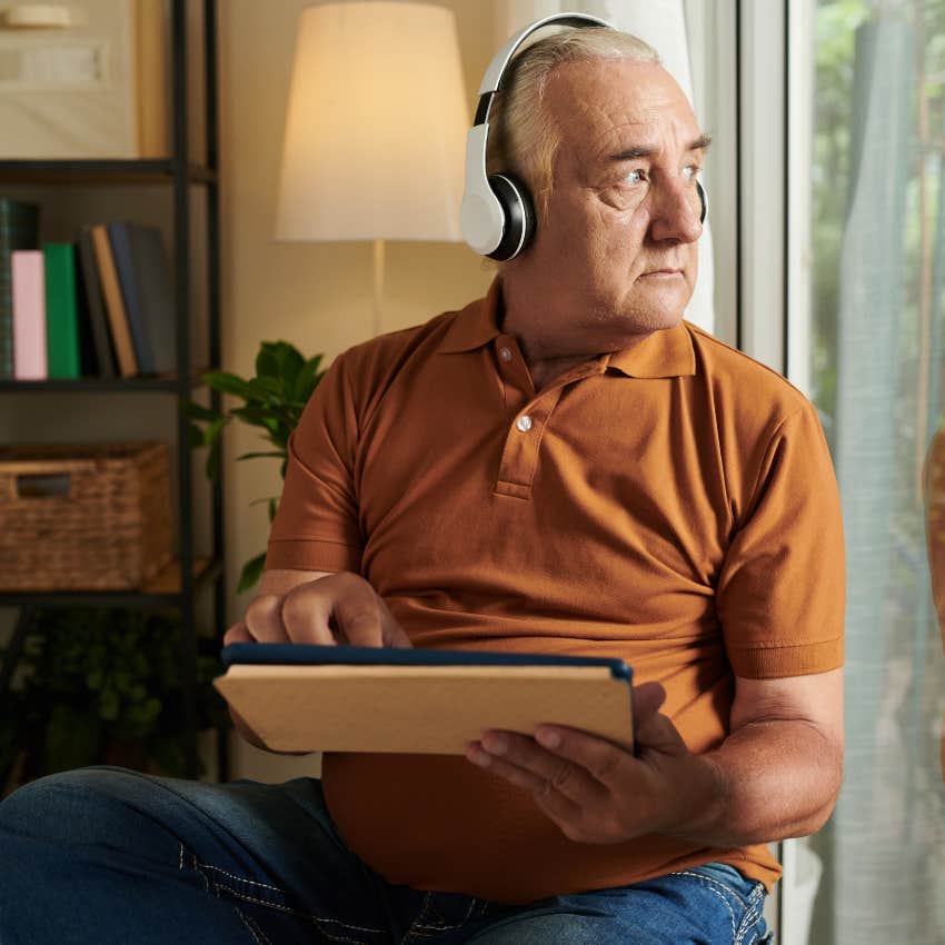 man getting emotional about music