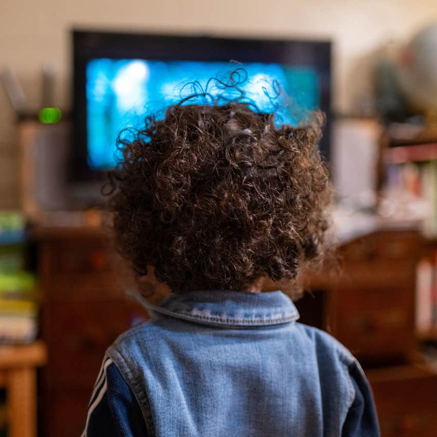 child watching tv for entertainment