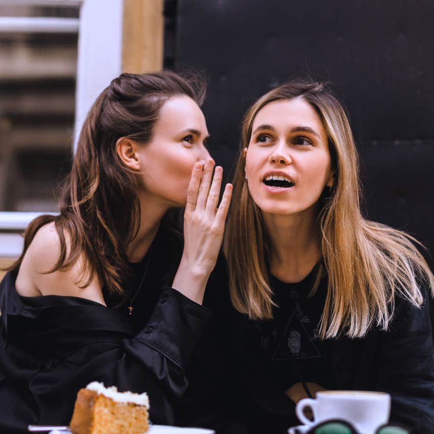 women speaking negatively about other people to her friend