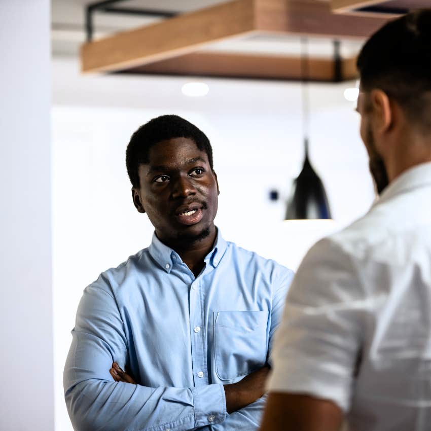 man who's good at reading a room noticing someone doesn't like him at work