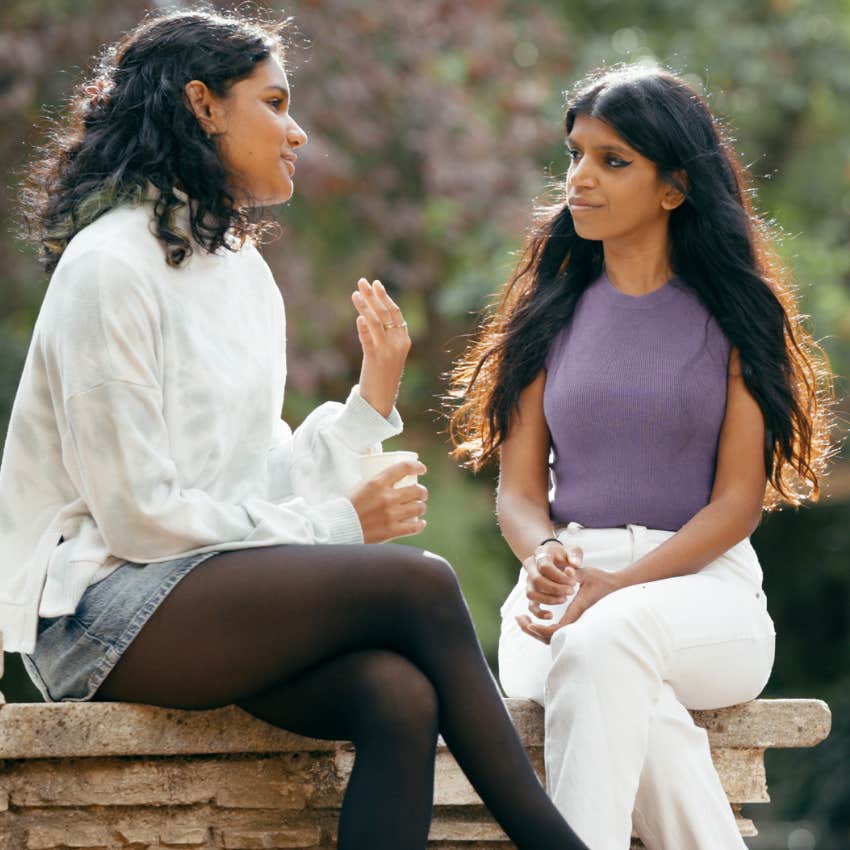 woman listening to her friend talk