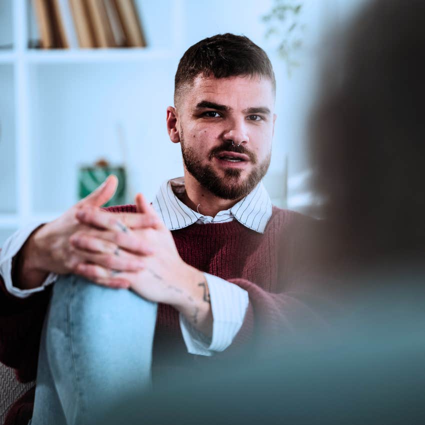 sensitive man talking to his partner at home