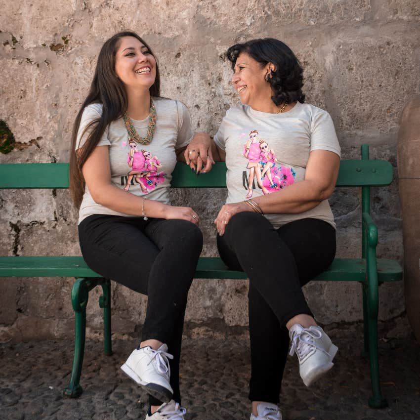 woman feeling happy from making her mother happy sitting together