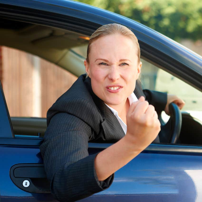 rude woman driving a car