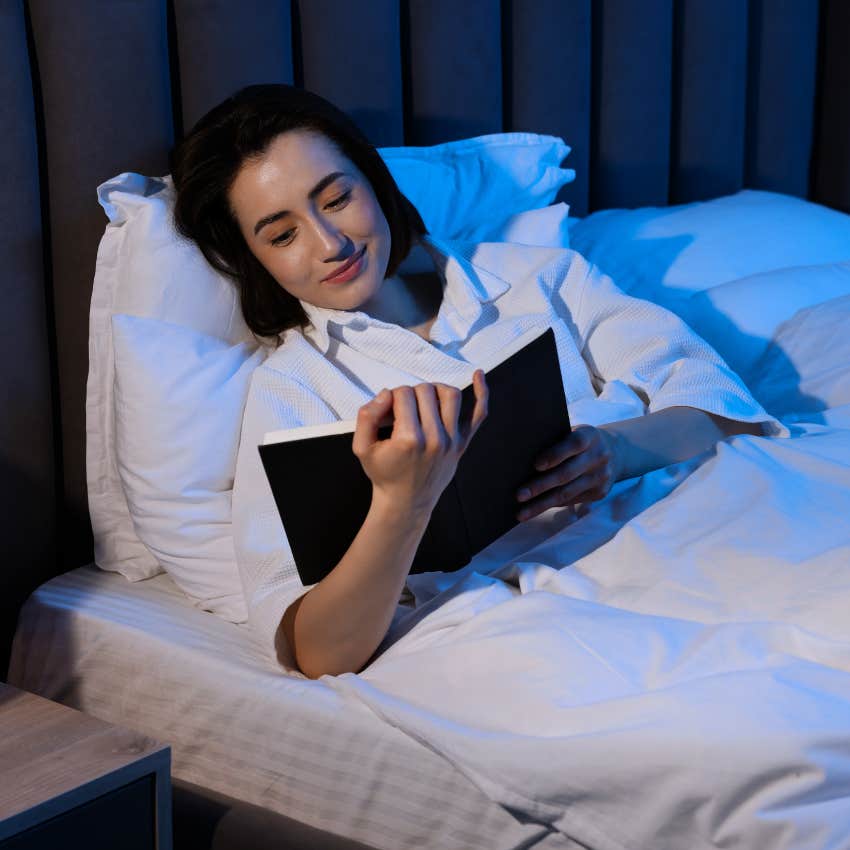 Woman who prefers getting cozy in bed before 9 PM after canceling plans to rest