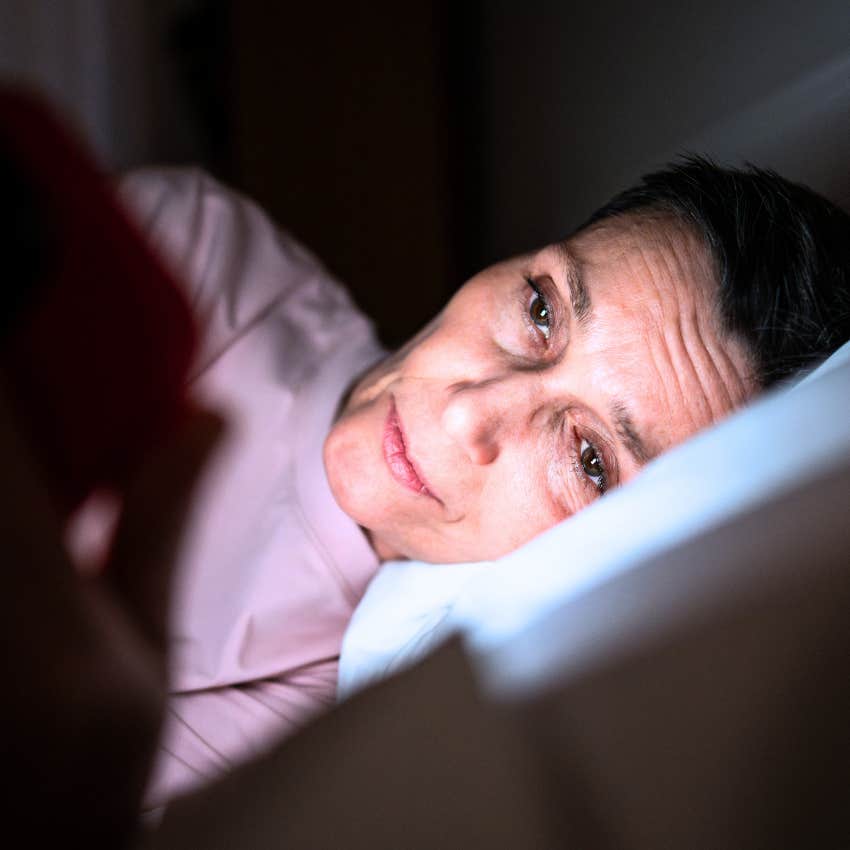 resentful woman dealing with constant pressure to be available on her phone