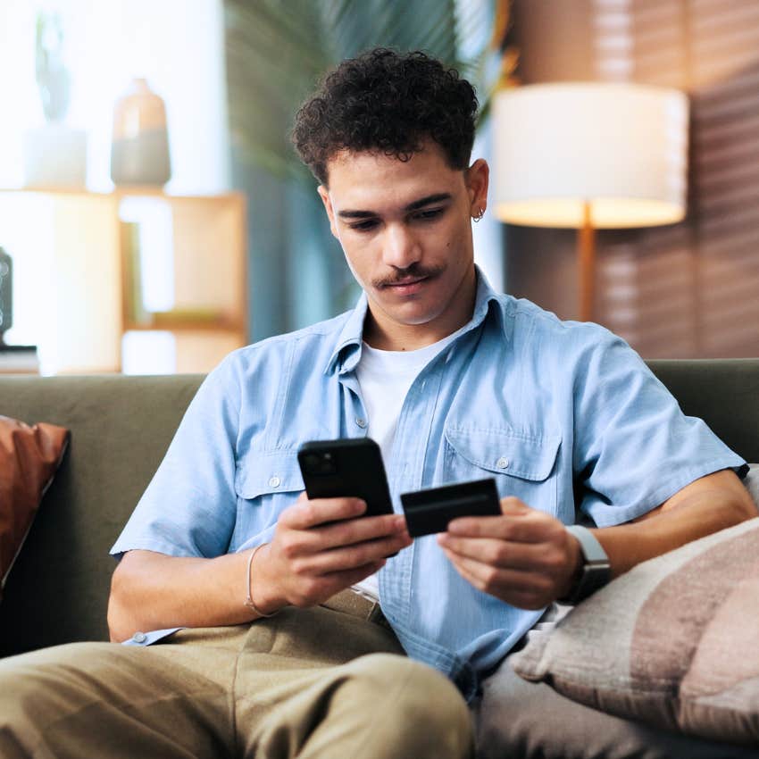 man looking at his phone feeling like convenience is making people unkind