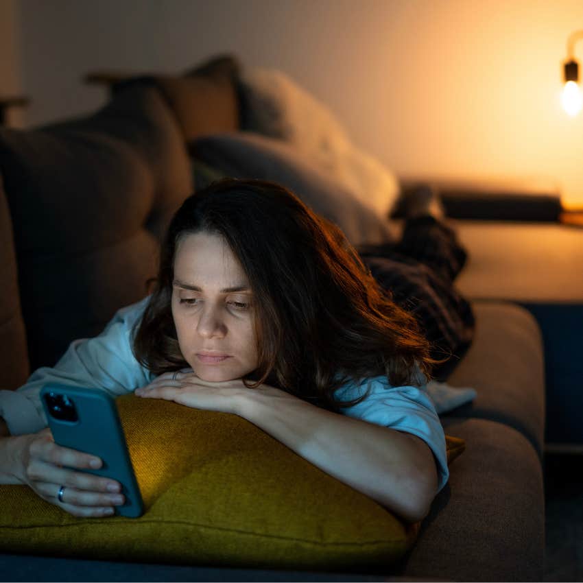 woman staying up too late doomscrolling