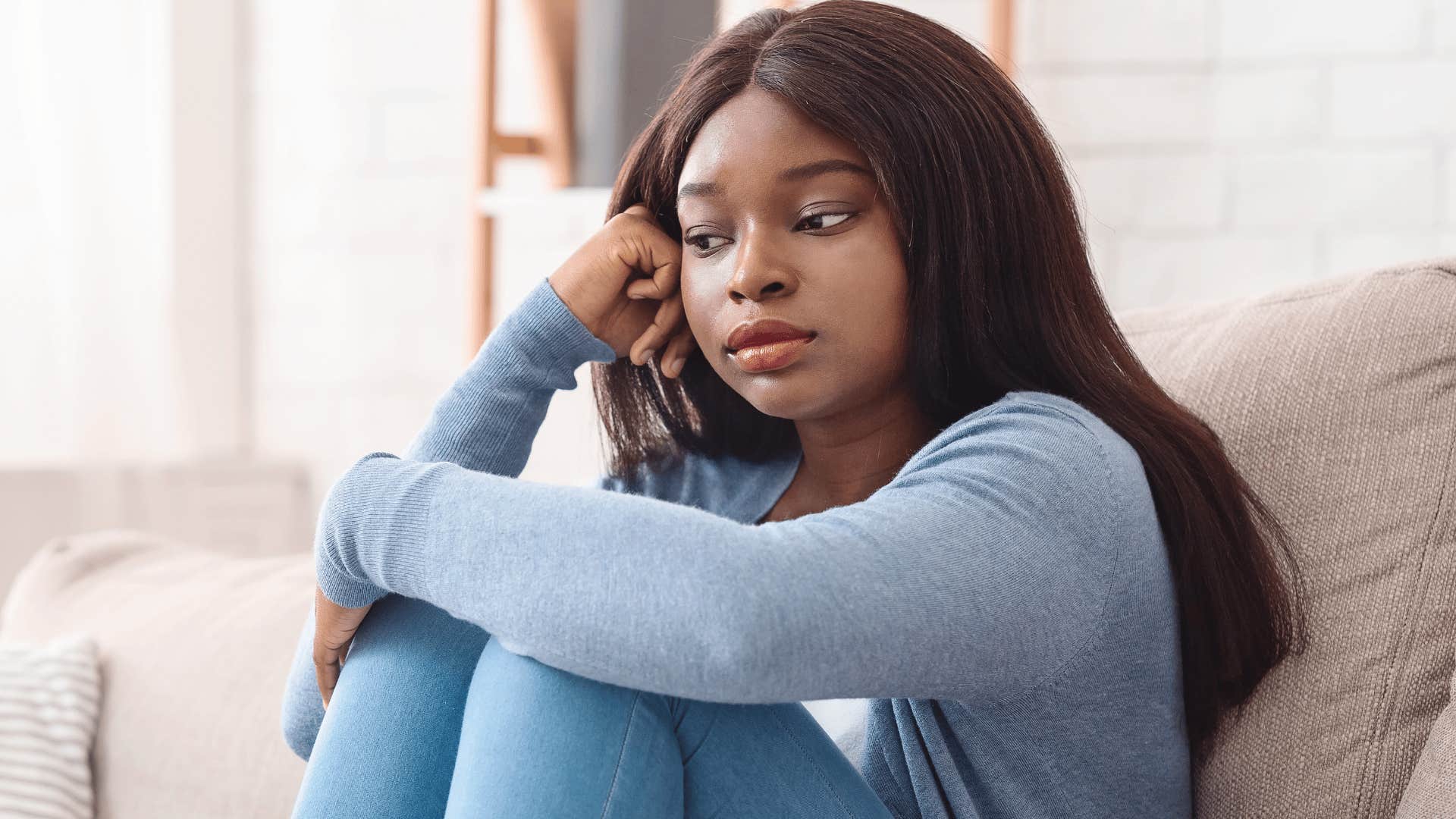 woman in blue shirt looking upset as she thinks i don't have the right to complain